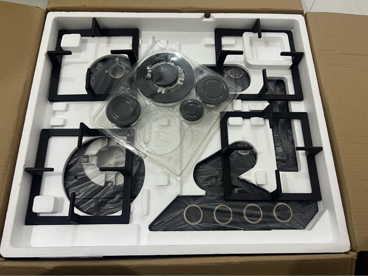 Premium Black Glass 4-Burner Cooker Hob with Heavy-Duty Cast Iron Pan Support, Battery Ignition & Blue Flame – Available at Trontronics.lk"
